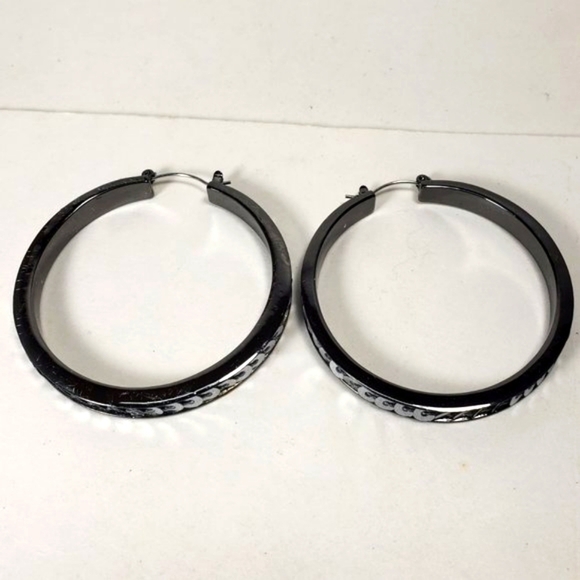 Women's Black Hoop Earrings with Polished Finish and Silver Tone Disc Accents - Picture 1 of 6